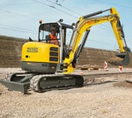 Backhoe vs. Mini Excavator Article